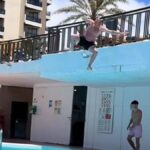tourists jump hotel pool tenerife 2026